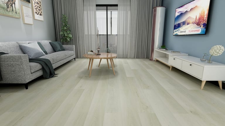 Pale greige SPC floor in a family room with blue walls