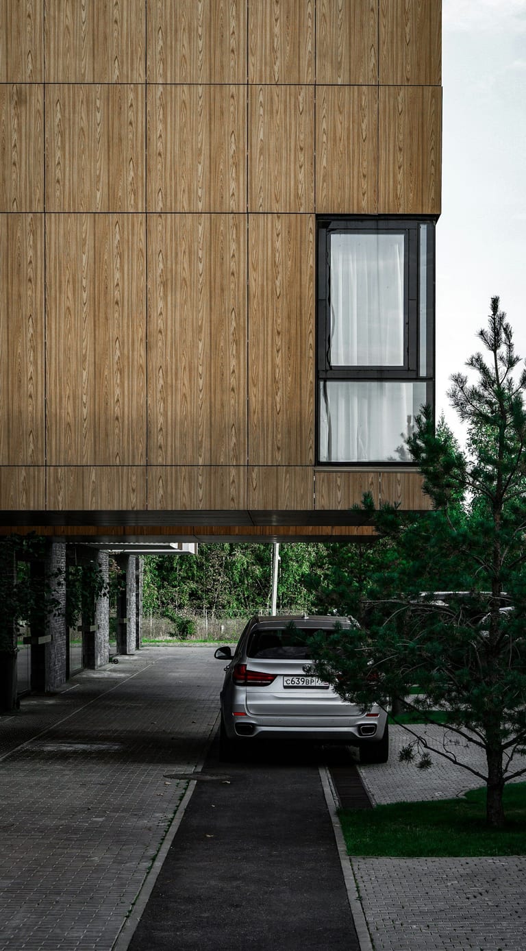 Dark wood-slat clad facade